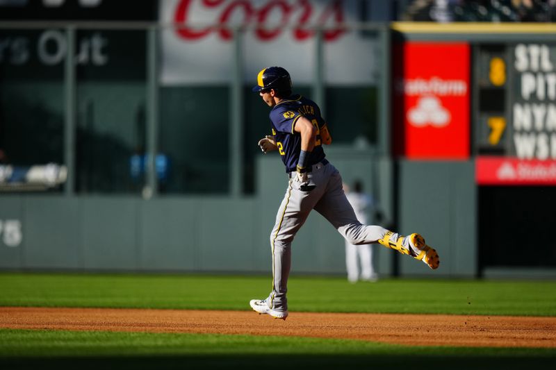 Jul 3, 2024; Denver, Colorado, USA; Milwaukee Brewers outfielder Christian Yelich (22) runs off a solo home run in the first inning against the Colorado Rockies at Coors Field. Mandatory Credit: Ron Chenoy-USA TODAY Sports