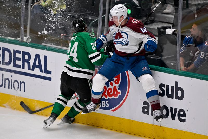 May 3, 2025; Dallas, Texas, USA; Dallas Stars center Roope Hintz (24) checks Colorado Avalanche defenseman Josh Manson (42) during the second period in game seven of the first round of the 2025 Stanley Cup Playoffs at American Airlines Center. Mandatory Credit: Jerome Miron-Imagn Images