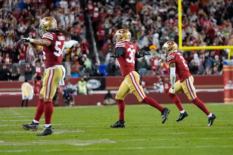 The San Francisco 49ers celebrate after a missed field goal by Green Bay Packers during the second half of an NFL football NFC divisional playoff game Saturday, Jan. 20, 2024, in Santa Clara, Calif. (AP Photo/Ashley Landis)