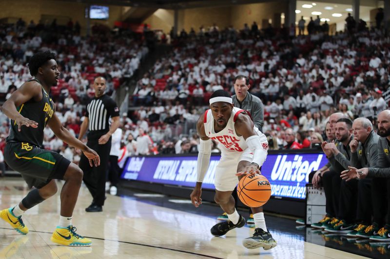 Jan 17, 2023; Lubbock, Texas, USA;  Texas Tech Red Raiders guard De   Vion Harmon (23) grabs a loose ball in front of Baylor Bears guard Adam Flagler (10) in the first half at United Supermarkets Arena. Mandatory Credit: Michael C. Johnson-USA TODAY Sports