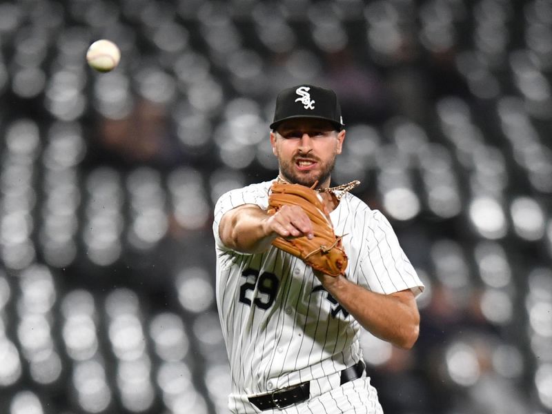 Apr 12, 2024; Chicago, Illinois, USA; Chicago White Sox shortstop Paul DeJong (29) throws out Cincinnati Reds designated hitter Nick Martini (not pictured) during the ninth inning at Guaranteed Rate Field. Mandatory Credit: Patrick Gorski-USA TODAY Sports