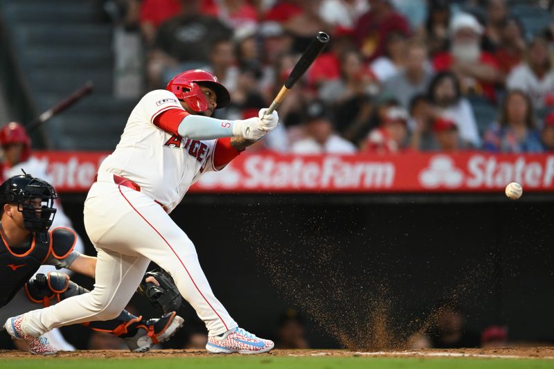 Jun 29, 2024; Anaheim, California, USA; Los Angeles Angels designated hitter Willie Calhoun (5) grounds out against the Detroit Tigers during the third inning at Angel Stadium. Mandatory Credit: Jonathan Hui-USA TODAY Sports