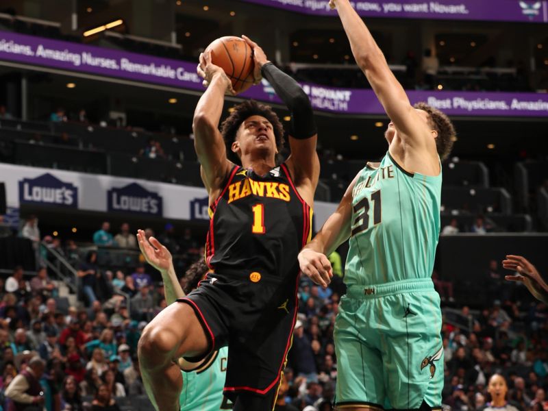 CHARLOTTE, NC - NOVEMBER 30: Jalen Johnson #1 of the Atlanta Hawks shoots the ball during the game against the Charlotte Hornets on November 30, 2024 at Spectrum Center in Charlotte, North Carolina. NOTE TO USER: User expressly acknowledges and agrees that, by downloading and or using this photograph, User is consenting to the terms and conditions of the Getty Images License Agreement. Mandatory Copyright Notice: Copyright 2024 NBAE (Photo by Kent Smith/NBAE via Getty Images)