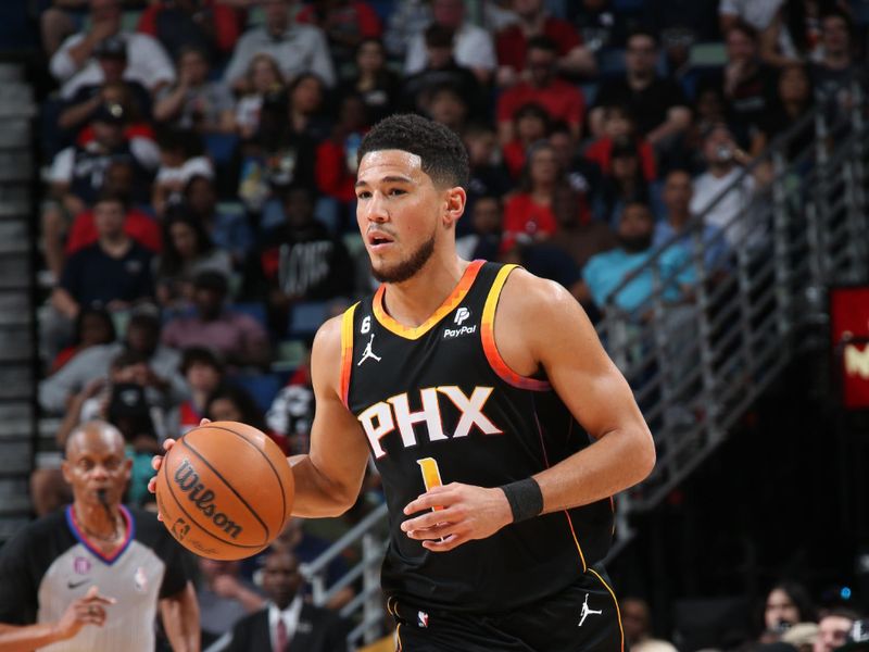 NEW ORLEANS, LA - DECEMBER 9: Devin Booker #1 of the Phoenix Suns dribbles the ball against the New Orleans Pelicans on December 9, 2022 at the Smoothie King Center in New Orleans, Louisiana. NOTE TO USER: User expressly acknowledges and agrees that, by downloading and or using this Photograph, user is consenting to the terms and conditions of the Getty Images License Agreement. Mandatory Copyright Notice: Copyright 2022 NBAE (Photo by Layne Murdoch Jr./NBAE via Getty Images)