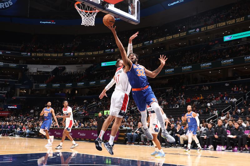 WASHINGTON, DC -? OCTOBER 18: Karl-Anthony Towns #32 of the New York Knicks drives to the basket during the game against the Washington Wizards on October 18, 2024 at Capital One Arena in Washington, DC. NOTE TO USER: User expressly acknowledges and agrees that, by downloading and or using this Photograph, user is consenting to the terms and conditions of the Getty Images License Agreement. Mandatory Copyright Notice: Copyright 2024 NBAE (Photo by Kenny Giarla/NBAE via Getty Images)