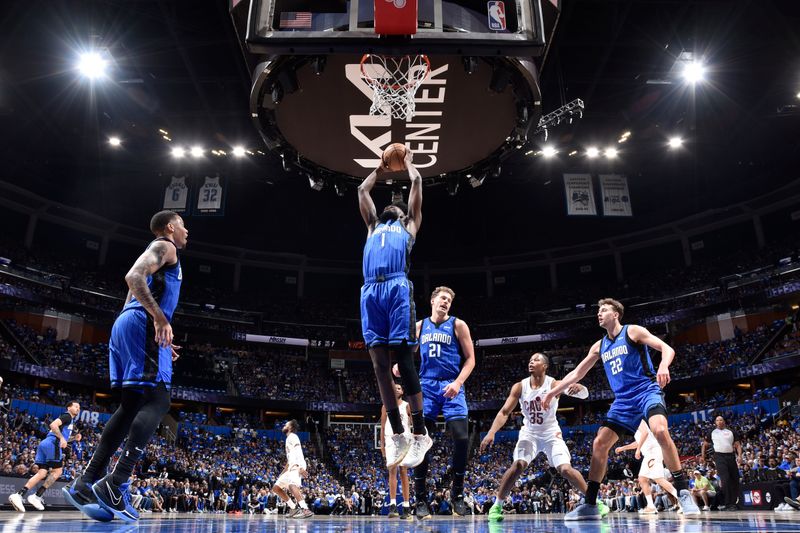 ORLANDO, FL - APRIL 27: Jonathan Isaac #1 of the Orlando Magic rebounds the ball during the game against the Cleveland Cavaliers during Round 1 Game 4 of the 2024 NBA Playoffs on April 27, 2024 at the Kia Center in Orlando, Florida. NOTE TO USER: User expressly acknowledges and agrees that, by downloading and or using this photograph, User is consenting to the terms and conditions of the Getty Images License Agreement. Mandatory Copyright Notice: Copyright 2024 NBAE (Photo by Fernando Medina/NBAE via Getty Images)