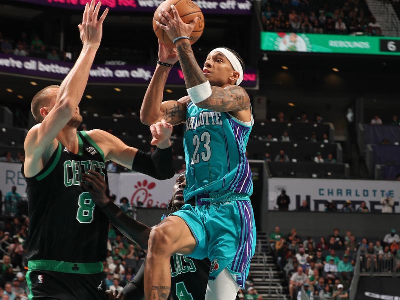 CHARLOTTE, NC - APRIL 1: Tre Mann #23 of the Charlotte Hornets drives to the basket during the game against the Boston Celtics on April 1, 2024 at Spectrum Center in Charlotte, North Carolina. NOTE TO USER: User expressly acknowledges and agrees that, by downloading and or using this photograph, User is consenting to the terms and conditions of the Getty Images License Agreement. Mandatory Copyright Notice: Copyright 2024 NBAE (Photo by Kent Smith/NBAE via Getty Images)