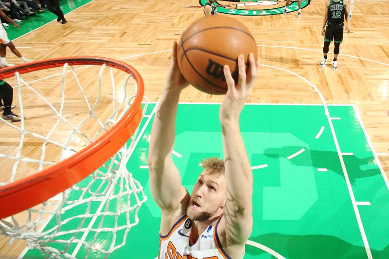 BOSTON, MA - FEBRUARY 3: Jock Landale #11 of the Phoenix Suns drives to the basket during the game against the Boston Celtics on February 3, 2023 at TD Garden in Boston, Massachusetts.  NOTE TO USER: User expressly acknowledges and agrees that, by downloading and or using this photograph, User is consenting to the terms and conditions of the Getty Images License Agreement. Mandatory Copyright Notice: Copyright 2022 NBAE  (Photo by Nathaniel S. Butler/NBAE via Getty Images)