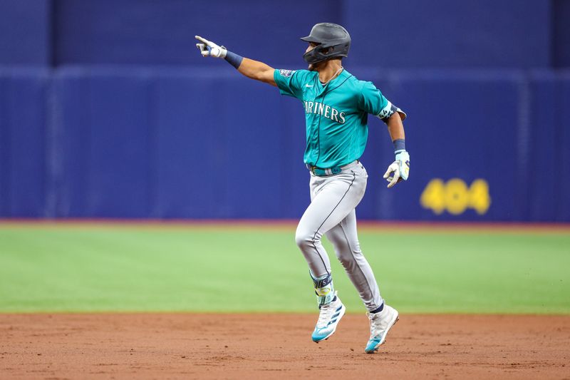 Sep 9, 2023; St. Petersburg, Florida, USA;  Seattle Mariners center fielder Julio Rodriguez (44) reacts after hitting a home run against the Tampa Bay Rays in the second inning at Tropicana Field. Mandatory Credit: Nathan Ray Seebeck-USA TODAY Sports