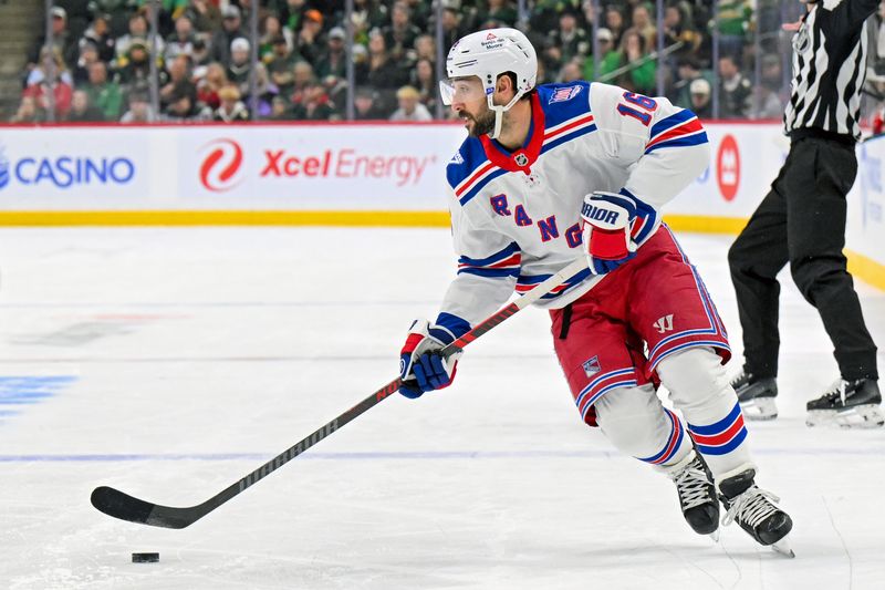 Mar 14, 2026; Saint Paul, Minnesota, USA;  New York Rangers forward Vincent Trocheck (16) controls the puck against the Minnesota Wild during the third period at Grand Casino Arena. Mandatory Credit: Nick Wosika-Imagn Images