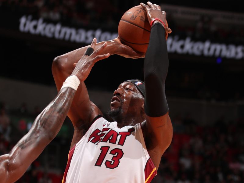 MIAMI, FL - MARCH 29: Bam Adebayo #13 of the Miami Heat shoots the ball during the game against the Portland Trail Blazers on March 29, 2024 at Kaseya Center in Miami, Florida. NOTE TO USER: User expressly acknowledges and agrees that, by downloading and or using this Photograph, user is consenting to the terms and conditions of the Getty Images License Agreement. Mandatory Copyright Notice: Copyright 2024 NBAE (Photo by Issac Baldizon/NBAE via Getty Images)