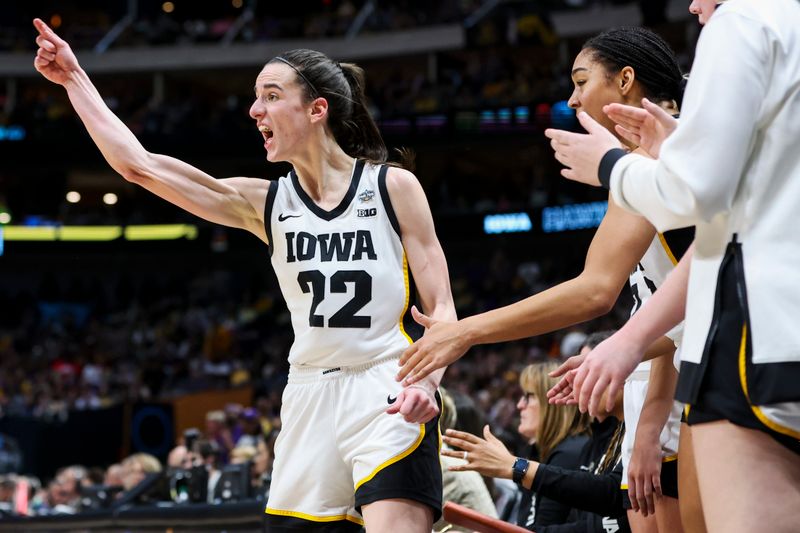 Apr 2, 2023; Dallas, TX, USA; Iowa Hawkeyes guard Caitlin Clark (22) reacts from the bench in the game against the LSU Lady Tigers in the first half during the final round of the Women's Final Four NCAA tournament at the American Airlines Center. Mandatory Credit: Kevin Jairaj-USA TODAY Sports