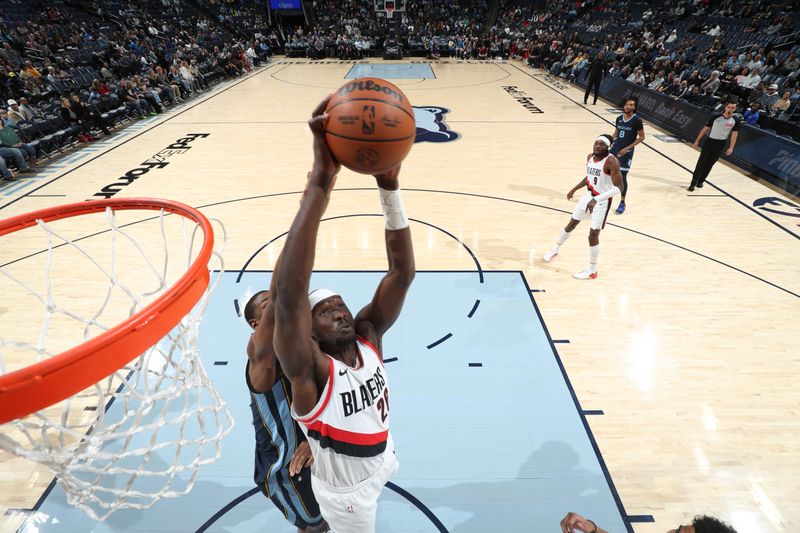 MEMPHIS, TN - MARCH 1: Duop Reath #26 of the Portland Trail Blazers grabs a rebound during the game against the Memphis Grizzlies on March 1, 2024 at FedExForum in Memphis, Tennessee. NOTE TO USER: User expressly acknowledges and agrees that, by downloading and or using this photograph, User is consenting to the terms and conditions of the Getty Images License Agreement. Mandatory Copyright Notice: Copyright 2024 NBAE (Photo by Joe Murphy/NBAE via Getty Images)