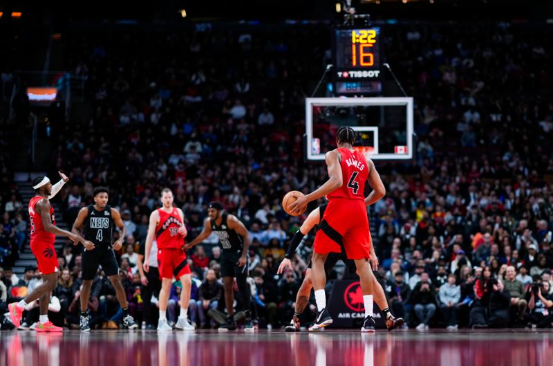 TORONTO, ON - JANUARY 1: Scottie Barnes #4 of the Toronto Raptors dribbles against the Brooklyn Nets during the second half of their basketball game at the Scotiabank Arena on January 1, 2025 in Toronto, Ontario, Canada. NOTE TO USER: User expressly acknowledges and agrees that, by downloading and/or using this Photograph, user is consenting to the terms and conditions of the Getty Images License Agreement. (Photo by Mark Blinch/Getty Images)