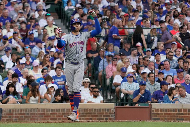 Jun 23, 2024; Chicago, Illinois, USA; New York Mets outfielder Brandon Nimmo (9) gestures after hitting a home run against the Chicago Cubs during the third inning at Wrigley Field. Mandatory Credit: David Banks-USA TODAY Sports