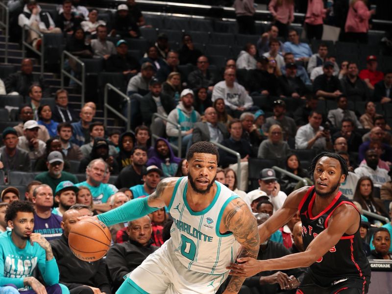 CHARLOTTE, NC - JANUARY 1: Miles Bridges #0 of the Charlotte Hornets handles the ball during the game against the Toronto Raptors on January 1, 2024 at Spectrum Center in Charlotte, North Carolina. NOTE TO USER: User expressly acknowledges and agrees that, by downloading and or using this photograph, User is consenting to the terms and conditions of the Getty Images License Agreement. Mandatory Copyright Notice: Copyright 2024 NBAE (Photo by Kent Smith/NBAE via Getty Images)