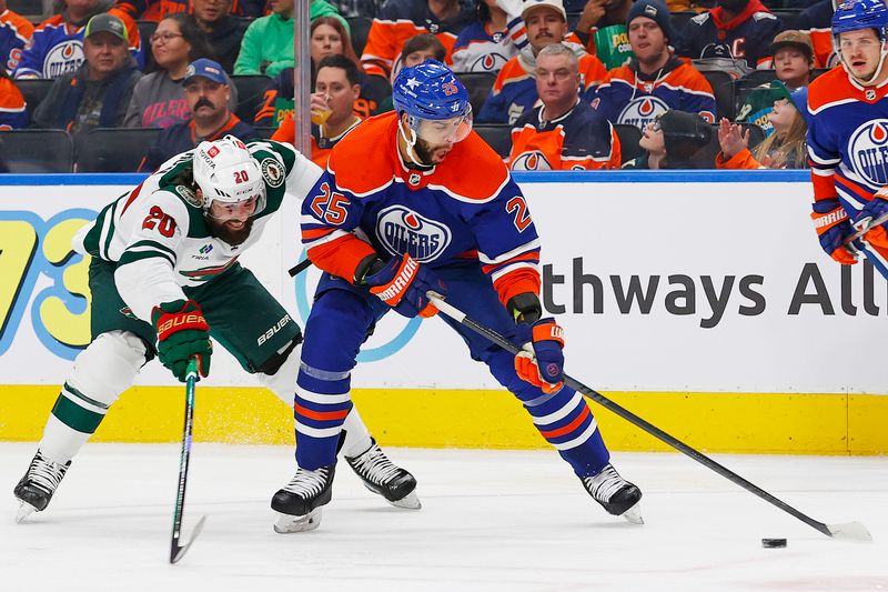 Dec 8, 2023; Edmonton, Alberta, CAN; Minnesota Wild forward Pat Maroon (20) tries to knock the puck away from Edmonton Oilers defensemen Darnell Nurse (25) during the second period at Rogers Place. Mandatory Credit: Perry Nelson-USA TODAY Sports