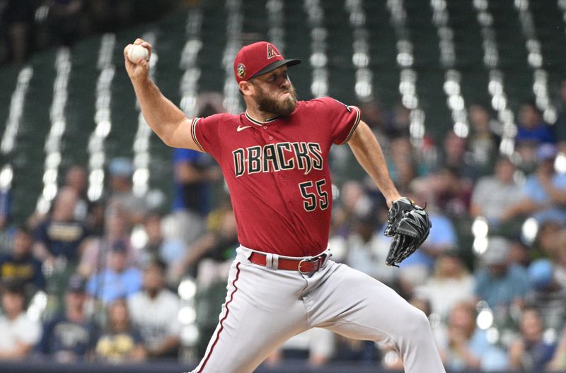 Jun 20, 2023; Milwaukee, Wisconsin, USA; Arizona Diamondbacks relief pitcher Austin Adams (55) delivers a pitch against the Milwaukee Brewers in the sixth inning at American Family Field. Mandatory Credit: Michael McLoone-USA TODAY Sports