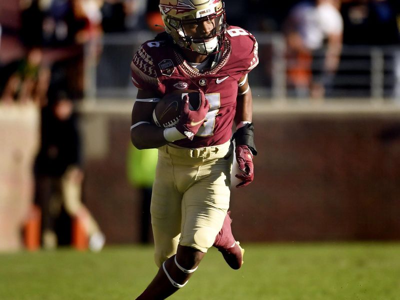 Nov 13, 2021; Tallahassee, Florida, USA;  Florida State Seminoles running back Treshaun Ward (8)runs downfield during the first quarter against the Miami Hurricanes at Doak S. Campbell Stadium. Mandatory Credit: Melina Myers-USA TODAY Sports