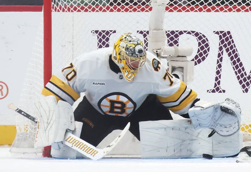 Mar 8, 2026; Pittsburgh, Pennsylvania, USA;  Boston Bruins goaltender Joonas Korpisalo (70) makes a save against the Pittsburgh Penguins during the second period at PPG Paints Arena. Mandatory Credit: Charles LeClaire-Imagn Images