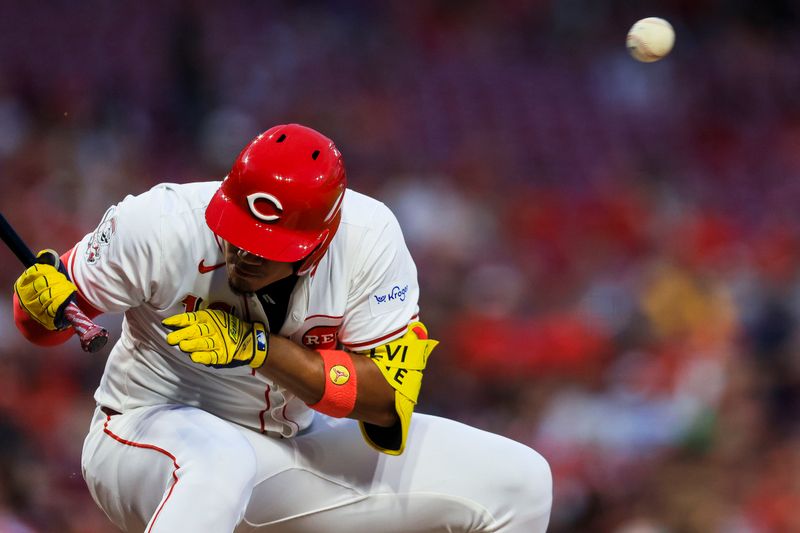 Jul 8, 2024; Cincinnati, Ohio, USA; Cincinnati Reds designated hitter Noelvi Marte (16) dodges a wild pitch in the seventh inning against the Colorado Rockies at Great American Ball Park. Mandatory Credit: Katie Stratman-USA TODAY Sports