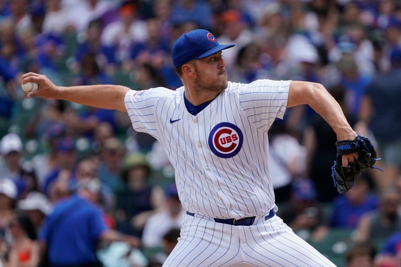 Jun 22, 2024; Chicago, Illinois, USA; Chicago Cubs pitcher Jameson Taillon (50) throws the ball against the New York Mets during the first inning at Wrigley Field. Mandatory Credit: David Banks-USA TODAY Sports