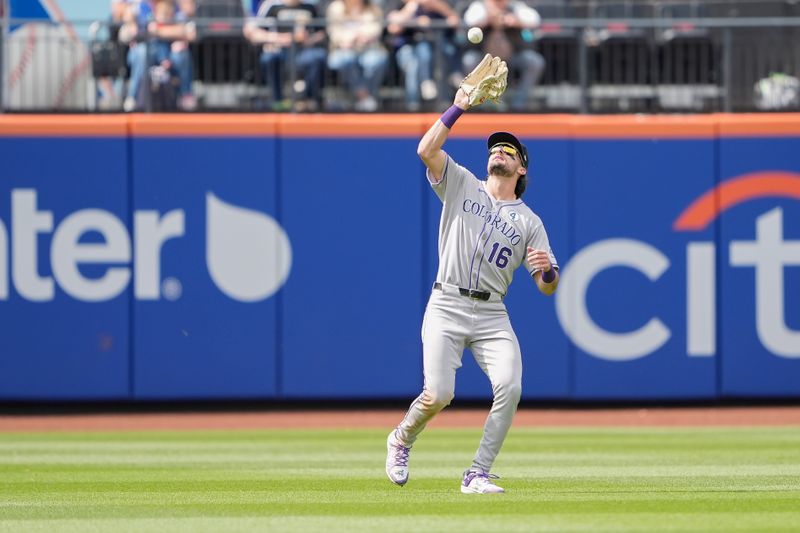Jun 1, 2025; New York City, New York, USA; Colorado Rockies center fielder Sam Hilliard (16) catches a fly ball hit by New York Mets first baseman Pete Alonso (20) (not pictured) during the eighth inning at Citi Field. Mandatory Credit: Gregory Fisher-Imagn Images