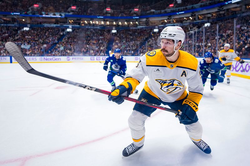 Nov 17, 2024; Vancouver, British Columbia, CAN; Nashville Predators forward Filip Forsberg (9) skates against the Vancouver Canucks during the third period at Rogers Arena. Mandatory Credit: Bob Frid-Imagn Images