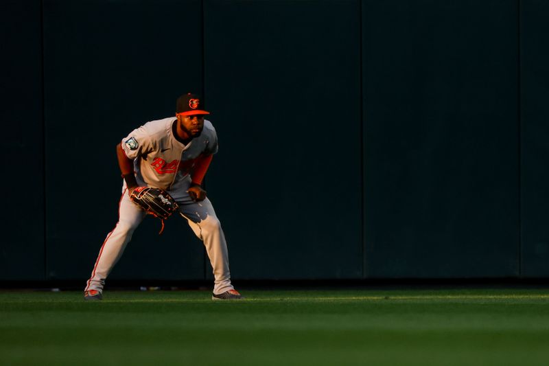 Jul 3, 2024; Seattle, Washington, USA; Baltimore Orioles center fielder Cedric Mullins (31) watches a pitch against the Seattle Mariners during the fifth inning at T-Mobile Park. Mandatory Credit: Joe Nicholson-USA TODAY Sports