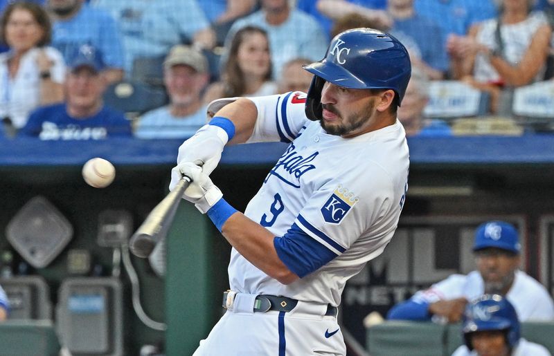 Jun 25, 2024; Kansas City, Missouri, USA; Kansas City Royals first baseman Vinnie Pasquantino (9) hits a RBI single in the first inning against the Miami Marlins at Kauffman Stadium. Mandatory Credit: Peter Aiken-USA TODAY Sports