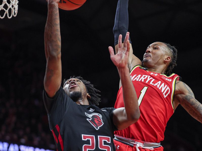 Feb 25, 2024; Piscataway, New Jersey, USA; Rutgers Scarlet Knights guard Jeremiah Williams (25) drives for a shot as Maryland Terrapins guard Jahmir Young (1) defends during the second half at Jersey Mike's Arena. Mandatory Credit: Vincent Carchietta-USA TODAY Sports