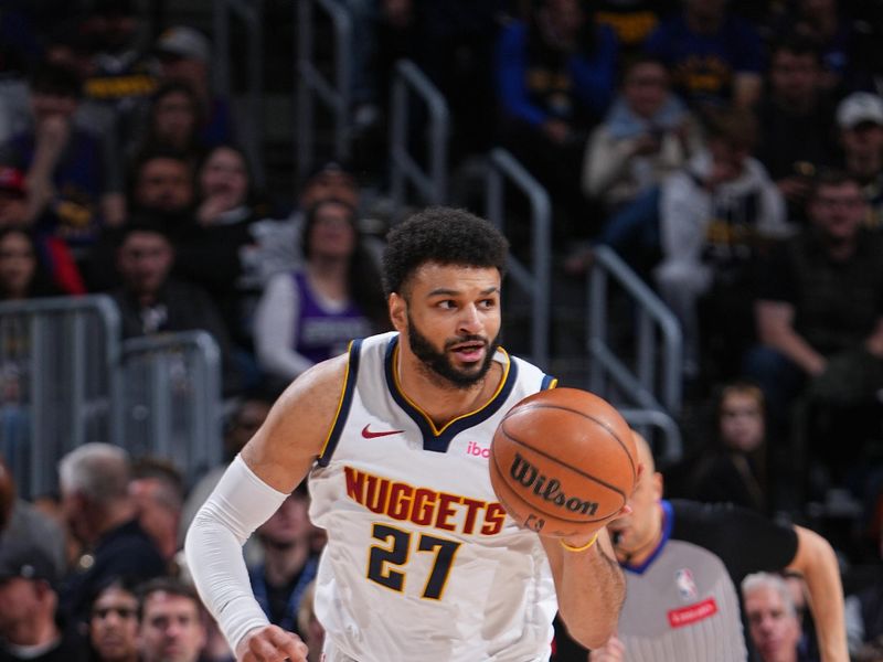 DENVER, CO - FEBRUARY 28: Jamal Murray #27 of the Denver Nuggets brings the ball up court during the game against the Sacramento Kings on February 28, 2024 at the Ball Arena in Denver, Colorado. NOTE TO USER: User expressly acknowledges and agrees that, by downloading and/or using this Photograph, user is consenting to the terms and conditions of the Getty Images License Agreement. Mandatory Copyright Notice: Copyright 2024 NBAE (Photo by Garrett Ellwood/NBAE via Getty Images)