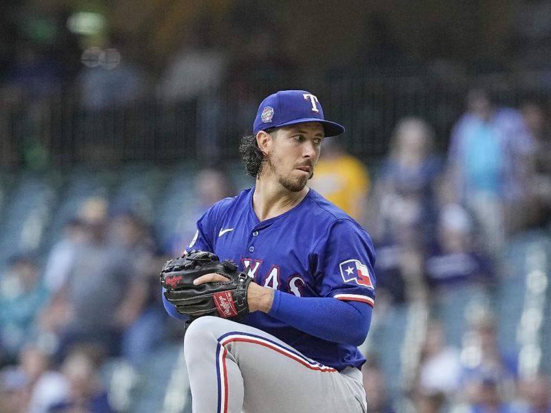 Jun 24, 2024; Milwaukee, Wisconsin, USA;  Texas Rangers pitcher Michael Lorenzen (23) throws a pitch during the first inning against the Milwaukee Brewers at American Family Field. Mandatory Credit: Jeff Hanisch-USA TODAY Sports