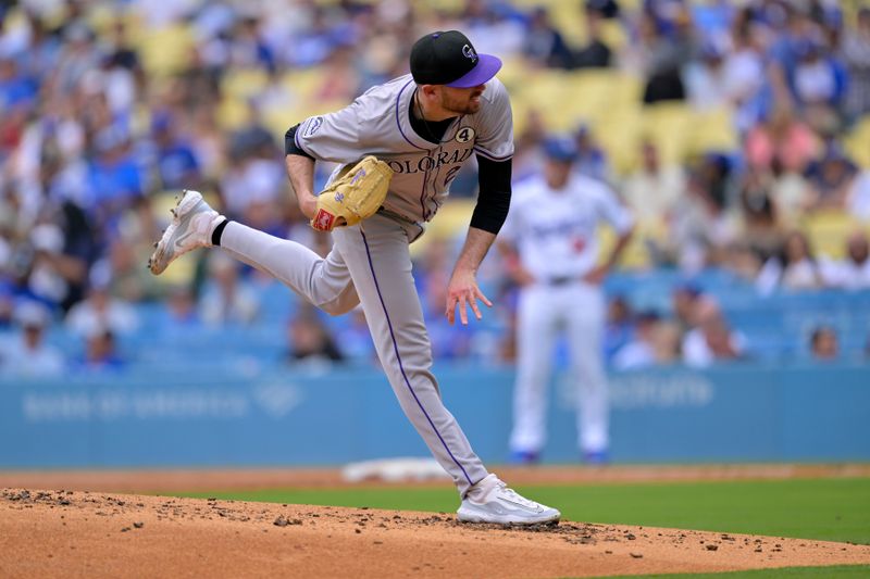 Jun 2, 2024; Los Angeles, California, USA;  Colorado Rockies pitcher Austin Gomber (26) delivers to the plate in the second inning against the Los Angeles Dodgers at Dodger Stadium. Mandatory Credit: Jayne Kamin-Oncea-USA TODAY Sports