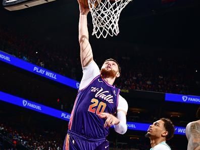 PHOENIX, AZ - DECEMBER 29: Jusuf Nurkic #20 of the Phoenix Suns drives to the basket during the game against the Charlotte Hornets on December 29 2023 at Footprint Center in Phoenix, Arizona. NOTE TO USER: User expressly acknowledges and agrees that, by downloading and or using this photograph, user is consenting to the terms and conditions of the Getty Images License Agreement. Mandatory Copyright Notice: Copyright 2023 NBAE (Photo by Barry Gossage/NBAE via Getty Images)