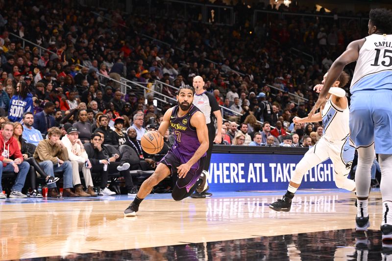 ATLANTA, GA - DECEMBER 6: Gabe Vincent #7 of the Los Angeles Lakers drives to the basket during the game against the Atlanta Hawks on December 6, 2024 at State Farm Arena in Atlanta, Georgia.  NOTE TO USER: User expressly acknowledges and agrees that, by downloading and/or using this Photograph, user is consenting to the terms and conditions of the Getty Images License Agreement. Mandatory Copyright Notice: Copyright 2024 NBAE (Photo by Adam Hagy/NBAE via Getty Images)