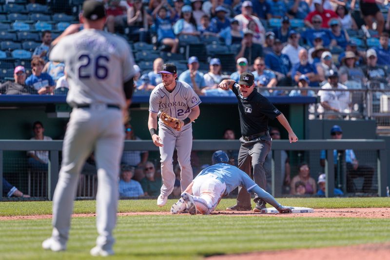 Jun 3, 2023; Kansas City, Missouri, USA; Kansas City Royals shortstop Bobby Witt Jr. (7) is called out after a throw to third base during the third inning against the Colorado Rockies at Kauffman Stadium. Mandatory Credit: William Purnell-USA TODAY Sports