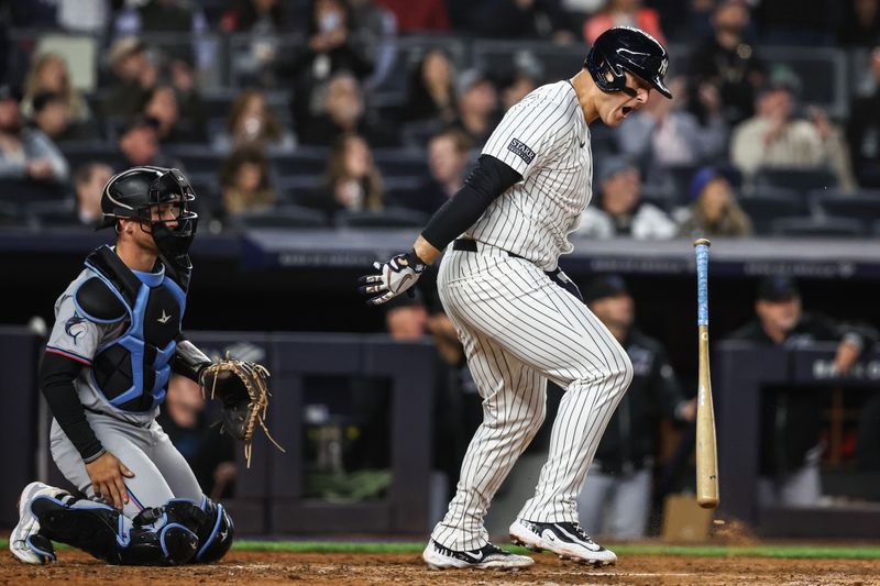 Apr 10, 2024; Bronx, New York, USA;  New York Yankees first baseman Anthony Rizzo (48) reacts after popping out with two runners on in the eighth inning against the Miami Marlins at Yankee Stadium. Mandatory Credit: Wendell Cruz-USA TODAY Sports