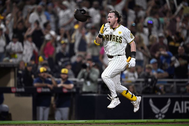 Jun 20, 2024; San Diego, California, USA; San Diego Padres second baseman Jake Cronenworth (9) tosses his helmet after hitting a walk-off home run during the ninth inning against the Milwaukee Brewers at Petco Park. Mandatory Credit: Orlando Ramirez-USA TODAY Sports