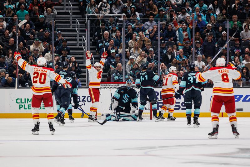 Oct 19, 2024; Seattle, Washington, USA; Calgary Flames center Blake Coleman (20) celebrates after scoring a goal against the Seattle Kraken during the first period at Climate Pledge Arena. Mandatory Credit: Caean Couto-Imagn Images