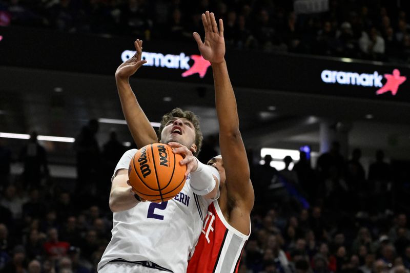 Jan 27, 2024; Evanston, Illinois, USA; Northwestern Wildcats forward Nick Martinelli (2) shoots against Ohio State Buckeyes forward Zed Key (23) during the second half  at Welsh-Ryan Arena. Mandatory Credit: Matt Marton-USA TODAY Sports