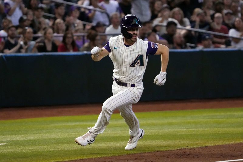 Aug 12, 2023; Phoenix, Arizona, USA; Arizona Diamondbacks left fielder Corbin Carroll (7) rounds third base and scores a run against the San Diego Padres during the first inning at Chase Field. Mandatory Credit: Joe Camporeale-USA TODAY Sports