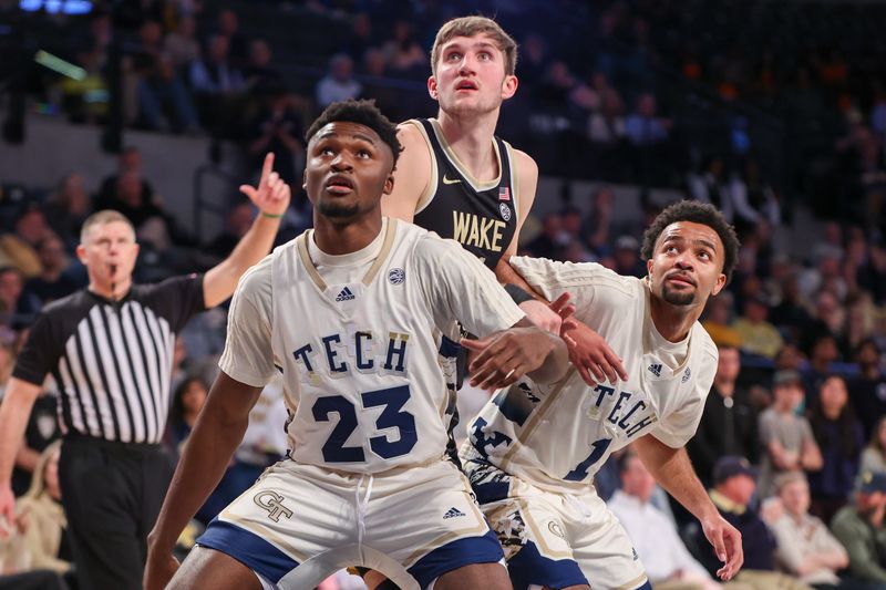 Feb 6, 2024; Atlanta, Georgia, USA; Georgia Tech Yellow Jackets forward Ibrahima Sacko (23) and guard Kyle Sturdivant (1) box out Wake Forest Demon Deacons forward Andrew Carr (11) in the first half at McCamish Pavilion. Mandatory Credit: Brett Davis-USA TODAY Sports
