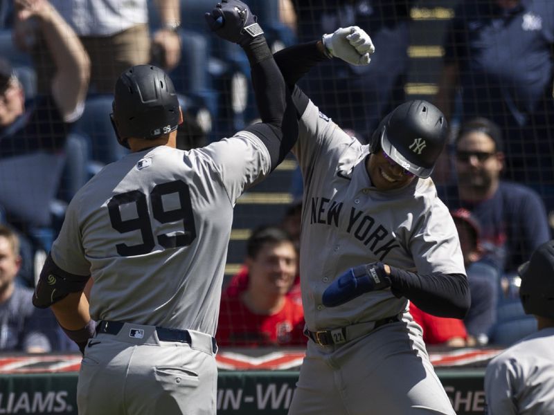 Apr 14, 2024; Cleveland, Ohio, USA; New York Yankees center fielder Aaron Judge (99) celebrates with right fielder Juan Soto (22) following his three-run home run during the third inning against the Cleveland Guardians at Progressive Field. Mandatory Credit: Scott Galvin-USA TODAY Sports