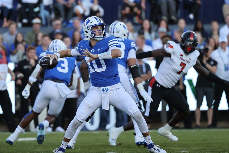 Oct 21, 2023; Provo, Utah, USA; Brigham Young Cougars quarterback Kedon Slovis (10) passes the ball against the Texas Tech Red Raiders in the first quarter at LaVell Edwards Stadium. Mandatory Credit: Rob Gray-USA TODAY Sports