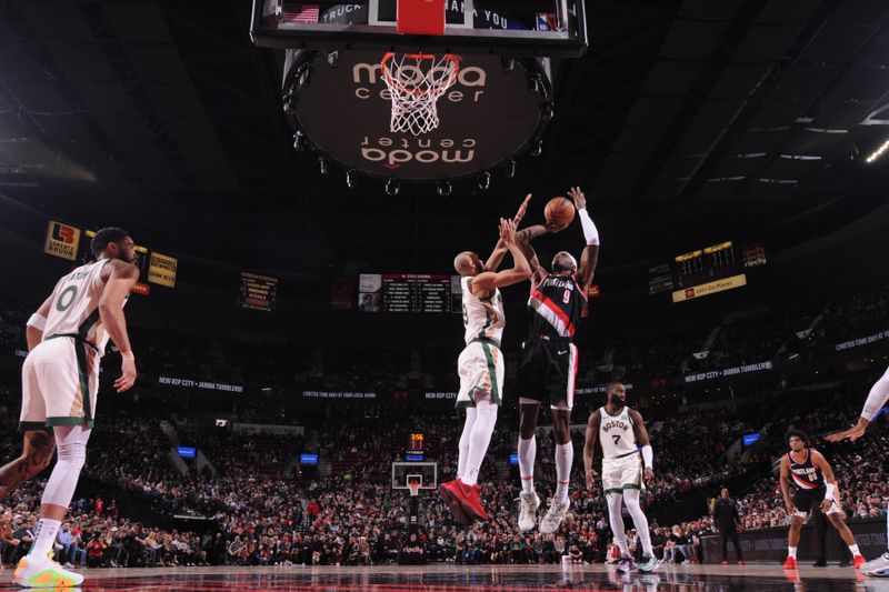 PORTLAND, OR - MARCH 11: Jerami Grant #9 of the Portland Trail Blazers drives to the basket during the game against the Boston Celtics on March 11, 2024 at the Moda Center Arena in Portland, Oregon. NOTE TO USER: User expressly acknowledges and agrees that, by downloading and or using this photograph, user is consenting to the terms and conditions of the Getty Images License Agreement. Mandatory Copyright Notice: Copyright 2024 NBAE (Photo by Cameron Browne/NBAE via Getty Images)