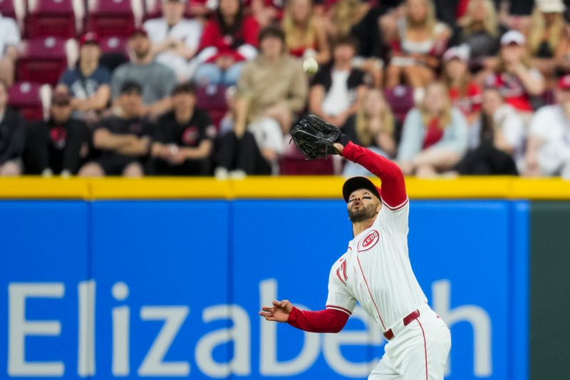 May 13, 2025; Cincinnati, Ohio, USA;  Cincinnati Reds outfielder Connor Joe (17) catches a fly ball for an out hit by Chicago White Sox third baseman Miguel Vargas (20) in the first inning at Great American Ball Park. Mandatory Credit: Aaron Doster-Imagn Images