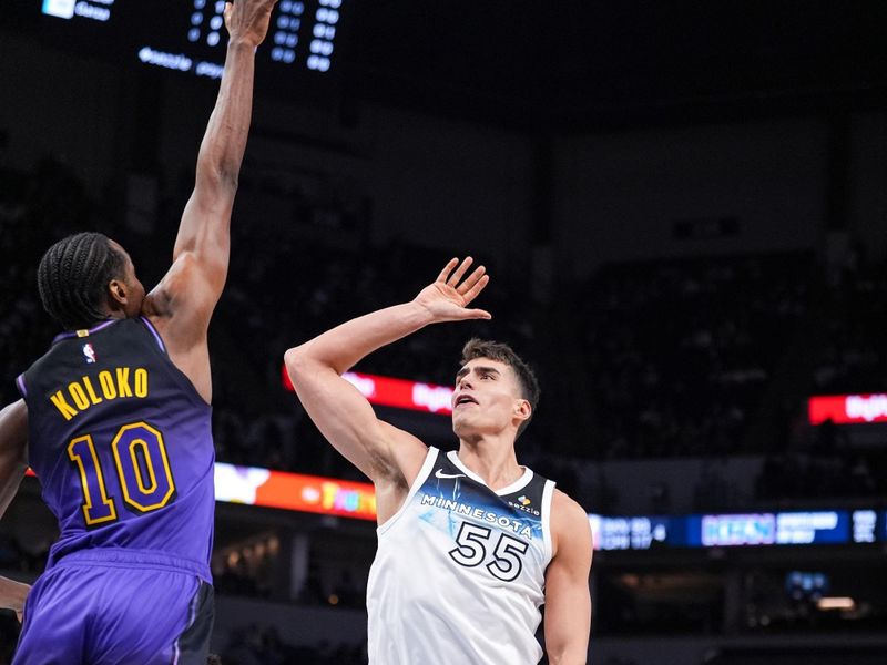 MINNEAPOLIS, MN - DECEMBER 2: Christian Koloko #10 of the Los Angeles Lakers blocks the ball during the game against the Minnesota Timberwolves on December 2, 2024 at Target Center in Minneapolis, Minnesota. NOTE TO USER: User expressly acknowledges and agrees that, by downloading and or using this Photograph, user is consenting to the terms and conditions of the Getty Images License Agreement. Mandatory Copyright Notice: Copyright 2024 NBAE (Photo by Jordan Johnson/NBAE via Getty Images)