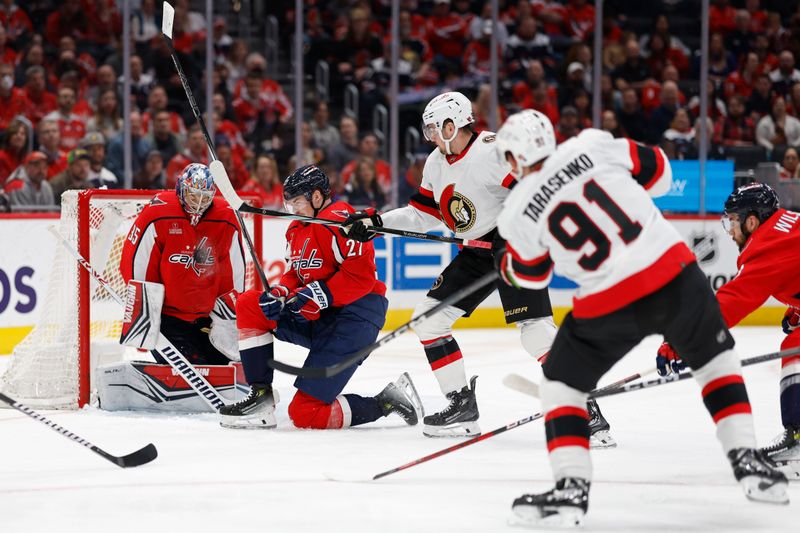 Feb 26, 2024; Washington, District of Columbia, USA; Washington Capitals goaltender Darcy Kuemper (35) makes a save on Ottawa Senators right wing Vladimir Tarasenko (91) in the second period at Capital One Arena. Mandatory Credit: Geoff Burke-USA TODAY Sports