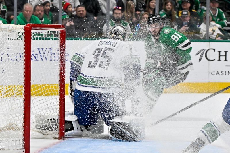 Dec 21, 2023; Dallas, Texas, USA; Vancouver Canucks goaltender Thatcher Demko (35) faces a shot by Dallas Stars center Tyler Seguin (91) during the overtime period at the American Airlines Center. Mandatory Credit: Jerome Miron-USA TODAY Sports